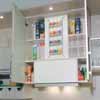 Flachschirmhaubenschrank